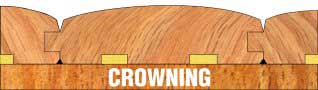 What causes wood floors to crown